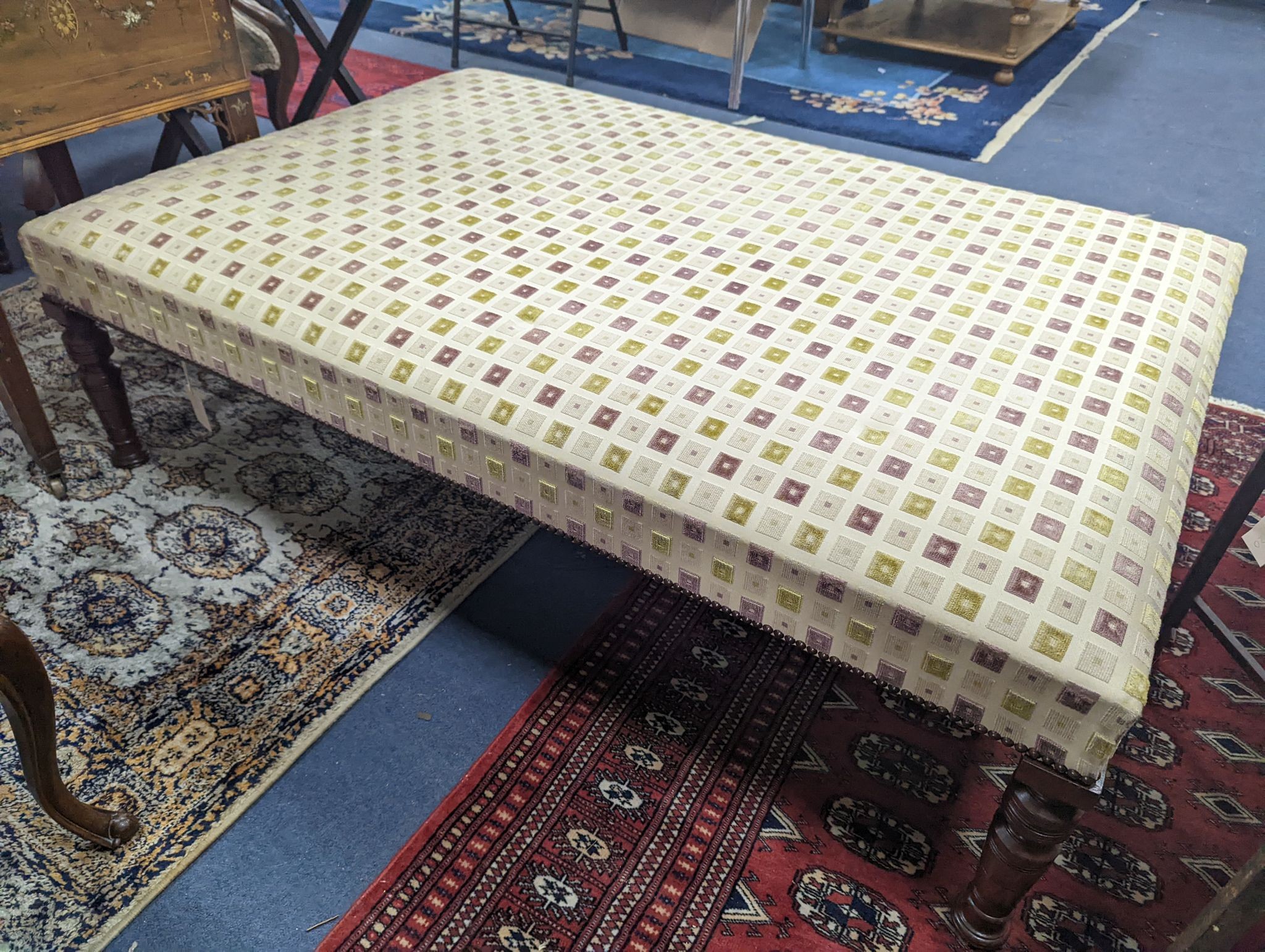 A Victorian and later large rectangular upholstered footstool, length 136cm, depth 90cm, height 40cm